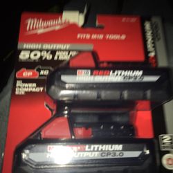 2 Milwaukee  three amp batteries