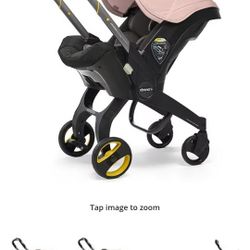 Doona Carseat/stroller In Pink
