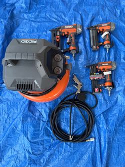 Ridgid Nail Guns Air Compressor with Hose attachment