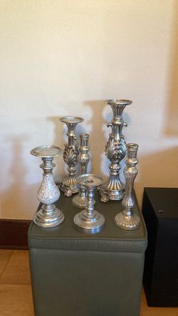 6 Decorative silver candlesticks