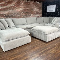 Delivery Available Costco Sereen gray modular sectional retails 2850