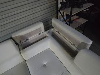 WHITE LEATHER SECTIONAL WITH CUP HOLDERS AND STORAGE
