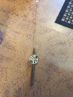 Vintage fishing pole and reel