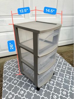 Three drawers of the well-known brand Sterilite® wheeled storage cabinet