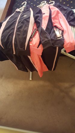 Girls New Balance and Nike zjogging Suits