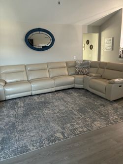 Leather reclining sectional sofa 6 months old