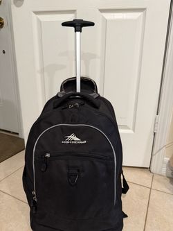 Backpack with wheels almost new