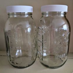 Set of 2 Ball 32-oz mason glass jars with white lids and measurement markings