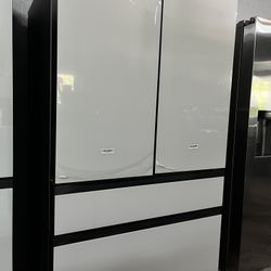 Bespoke 36 in. 29 cu. ft. Standard Depth 4-Door French Door Refrigerator with Sphere Ice in White Panels.