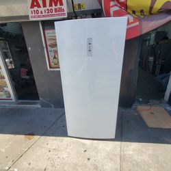 stand up freezer GE 20 cubic feet....33 by 72 new open box warranty..$750