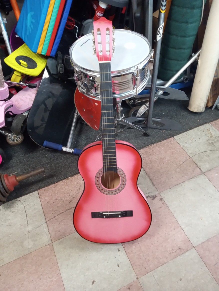 Adult acoustic guitar
