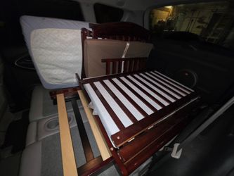 2 Dismantled Mahogany/Black Cribs/Toddler Bed