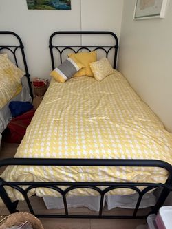 Black metal twin bed with mattress
