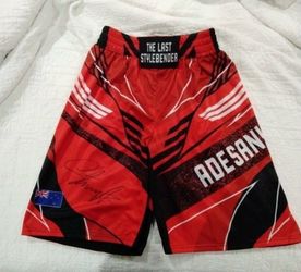Israel Adesanya Signed UFC Glove & Trunks Set - Beckett Authenticated