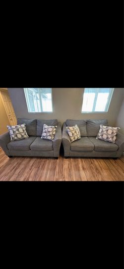 Two grey loves seats