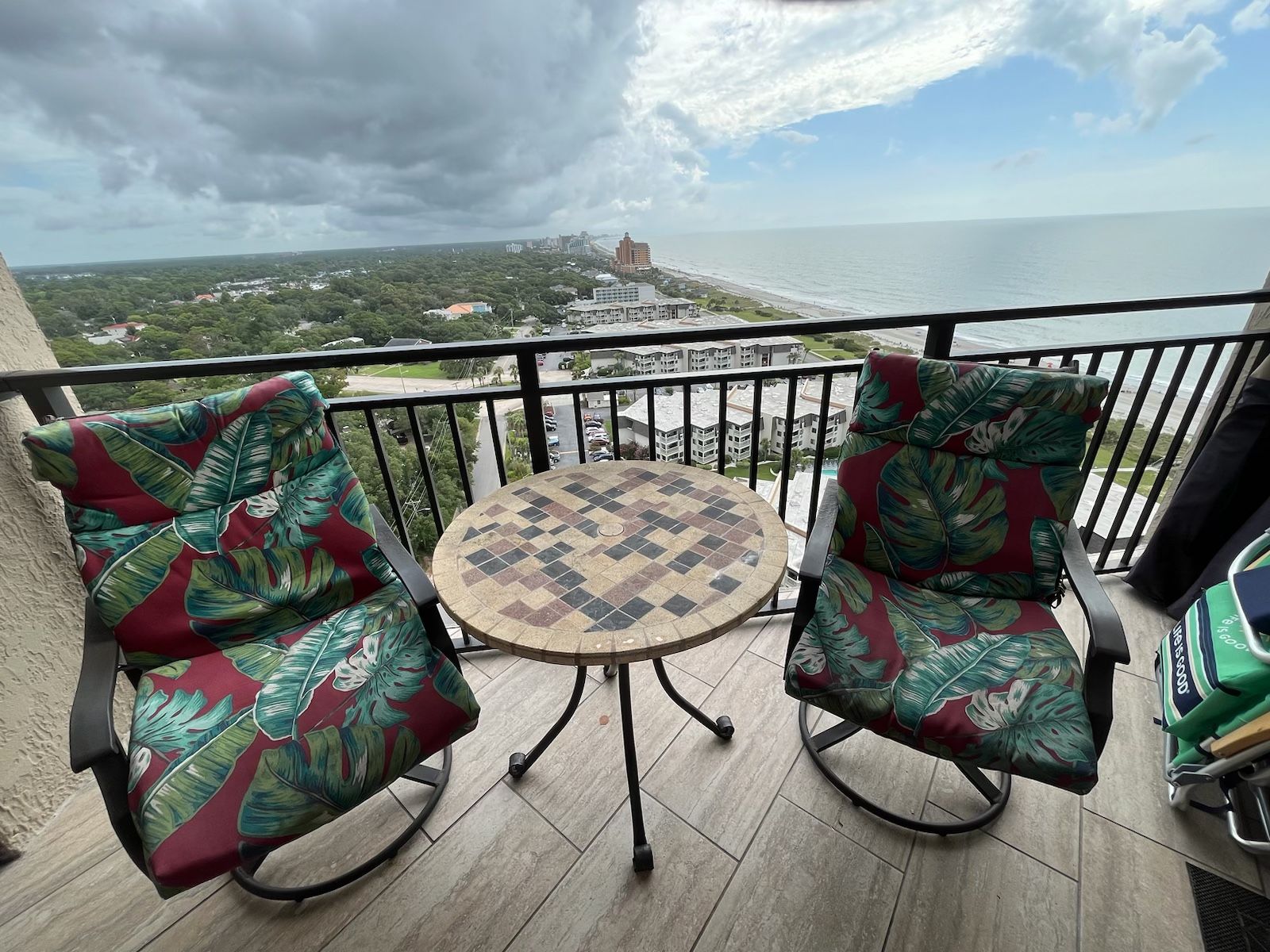 Beautiful Outdoor Swivel Rockers And Stone Top Table