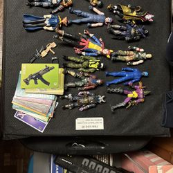 Assorted Fortnite 5” & 6” action figure toys plus trading cards.