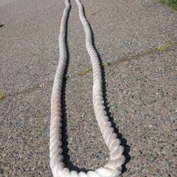 Work Out Heavy Rope 18 Feet Total And Has Plastic Protection On Middle and black hand grips hand grips on each end. 
