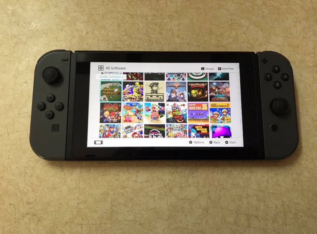 NINTENDO SWITCH V2 with 125 SWITCH GAMES and 7500 RETRO GAMES