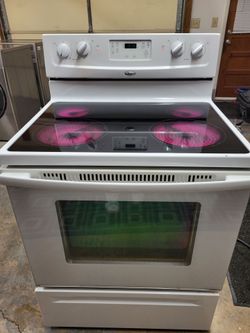 Whirlpool glasstop stove (delivery available )