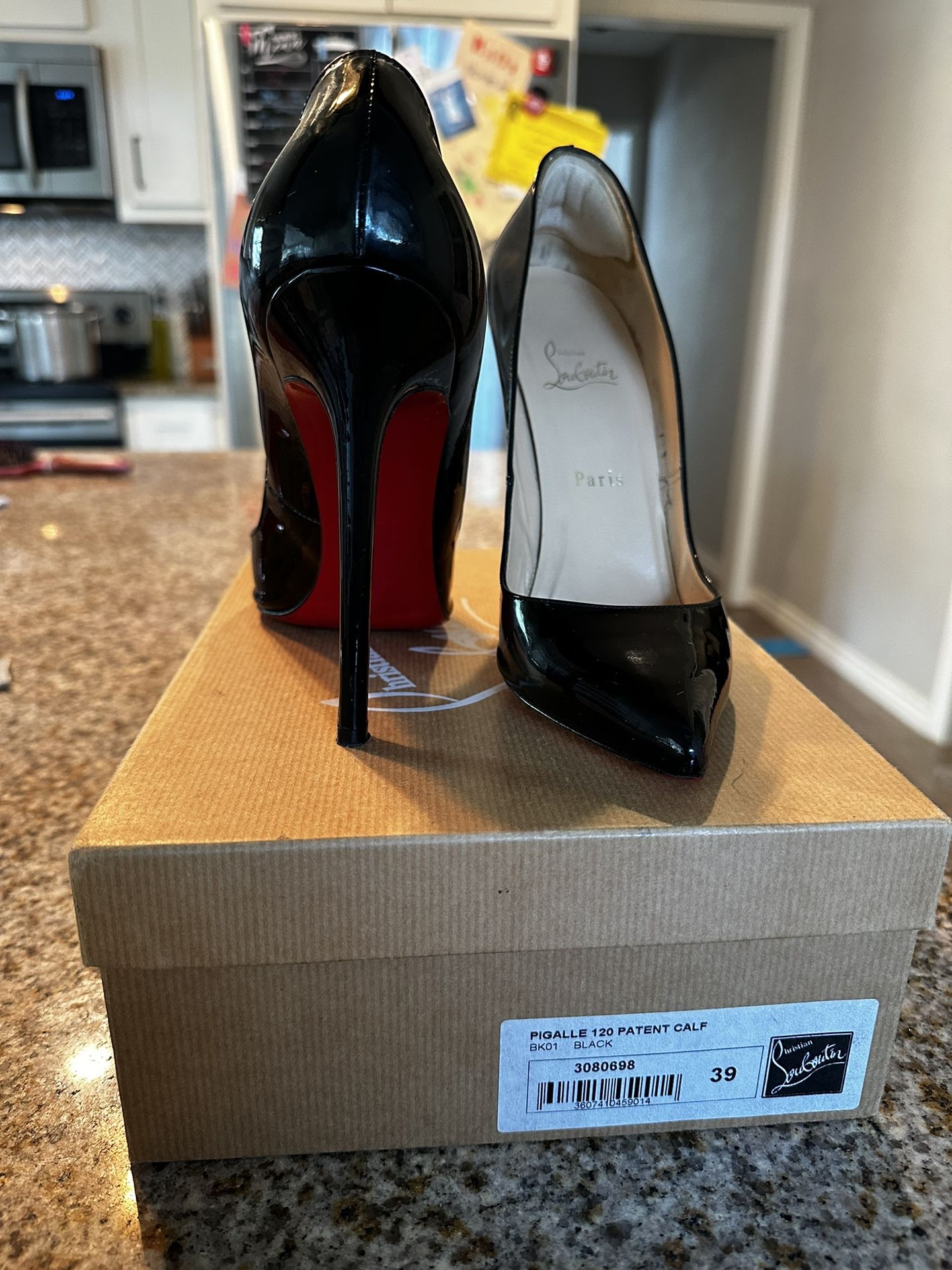 Christian Louboutin (8.5)