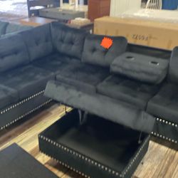 Sectional black couch with ottoman only gone for 699