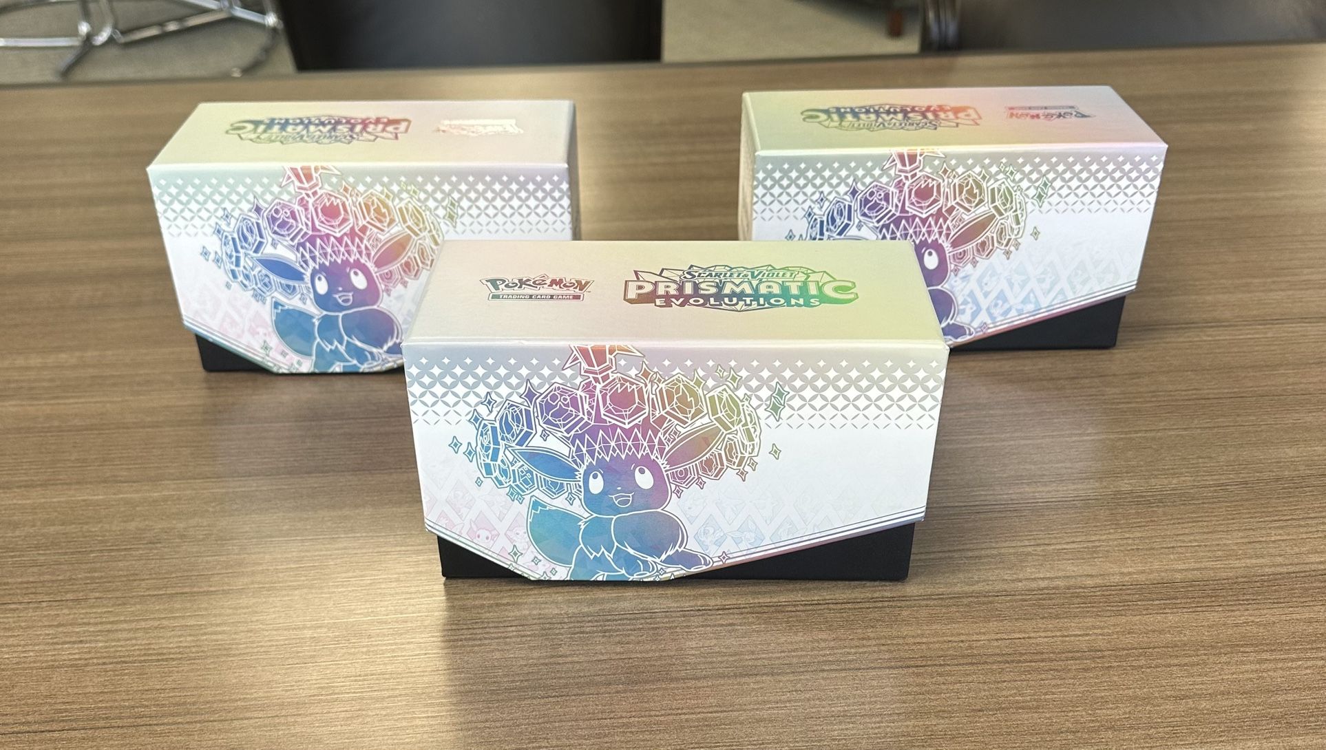 Open Scarlet and Violet Prismatic Evolutions Boxes with Cards