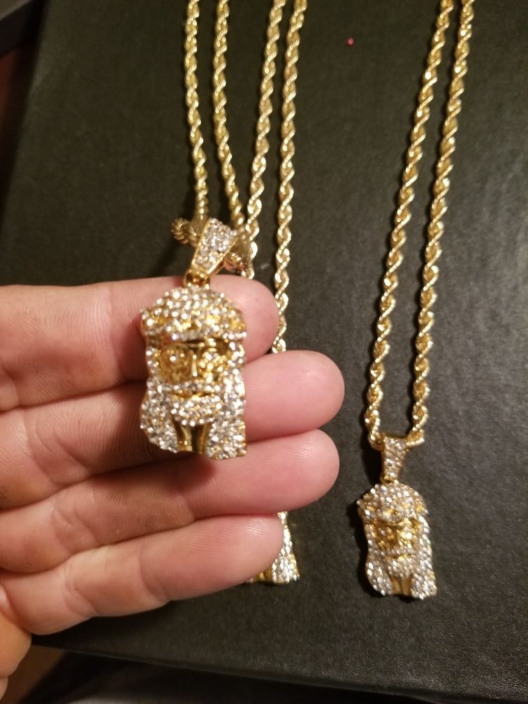 14k gold plated, iced out jesus pendant, on rope chain.