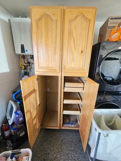 Tall Oak Wood Pantry Cabinet with Pull-Out Shelves