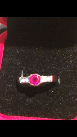 14kt gold ring with diamonds and red stone