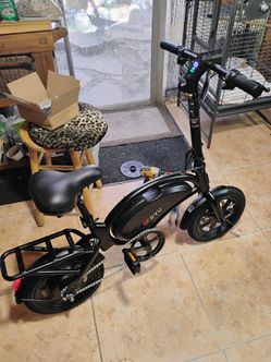 Ebike 20mph 25 miles range new with charger and toolkit and back rack.