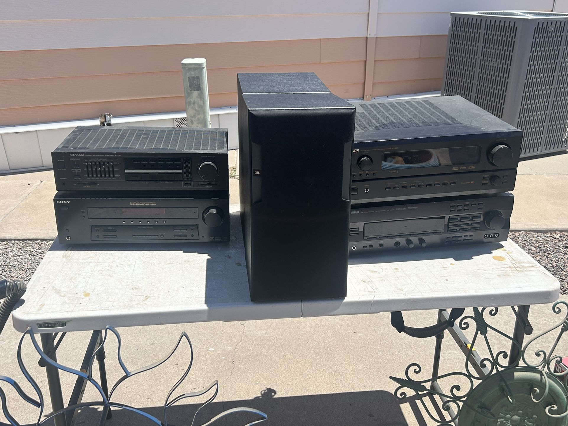 Various Receivers And A Pair Of JBL Speakers