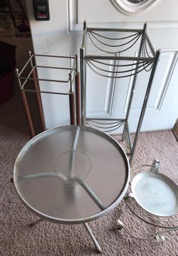 Four elegance and beautiful metal planters. Spring is here planting flowers. Prices ranging from $3 to $7