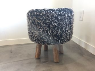 Cute gray furry ottoman footstool