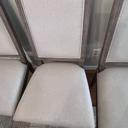 4 Upholstered dining room chairs . Great condition .