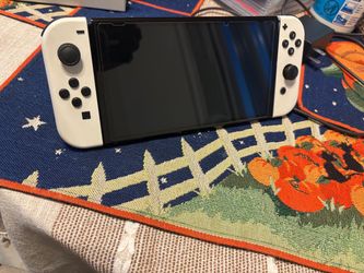 Nintendo Switch OLED White WITH 8 games