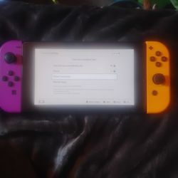 Nintendo Switch with remote and switch sports game