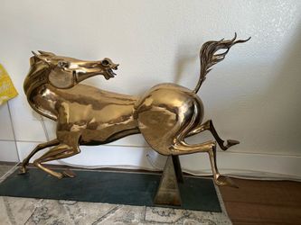 Horse polished metal sculpture