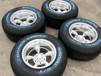 BRAND NEW 15X10 WHEELS AND TIRES