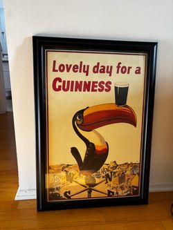 Large glass framed Guinness poster