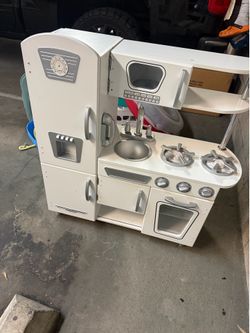 Kids play kitchen with extras
