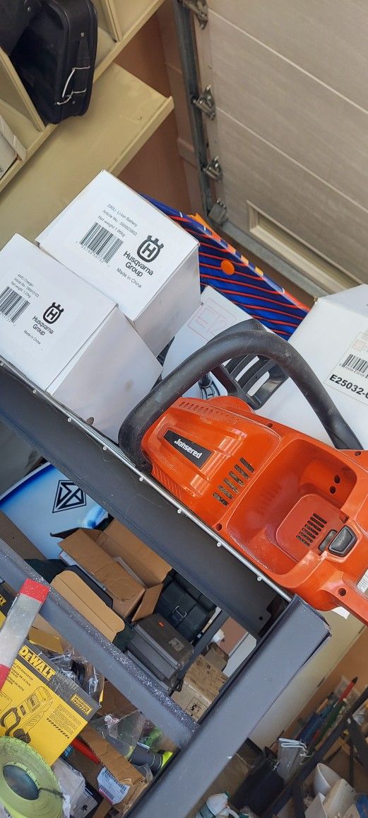 Jonsered 58 Volt Cordless Chainsaw — 16in with battery and charger Model# CS16i $150