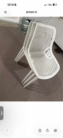 4 outdoor resin white dining chairs , stackable !