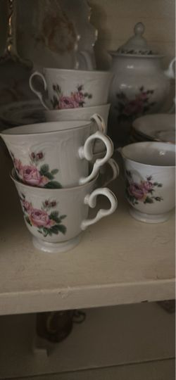 Vintage Porcelain 8 place settings with Rose Pattern