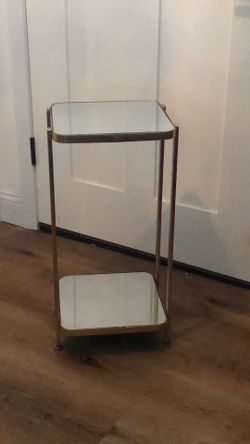 Pretty gold mirrored side table