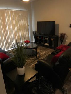 BLACK RECLINER TWO SET COUCH