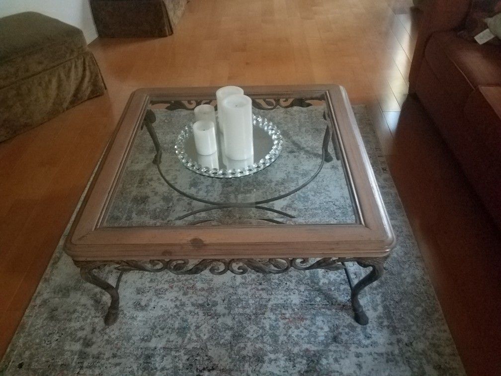 glass coffee table with Iron around