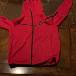 A Red Nike Tech And  A essentials Hoodie
