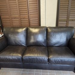 Cindy Crawford Home Leather Sofa.