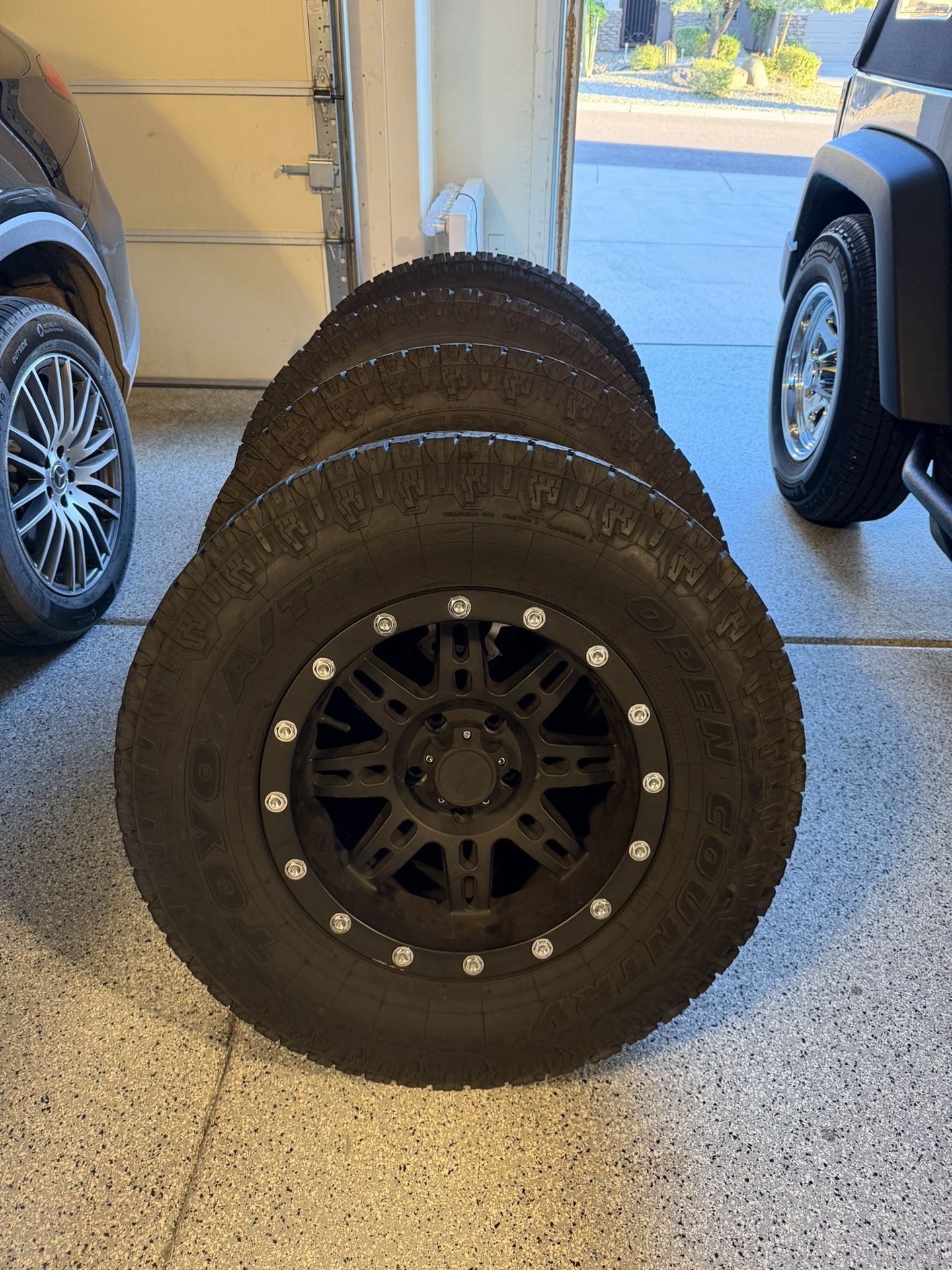 JEEP TOYO A/T II TIRES AND PRO COMP WHEELS